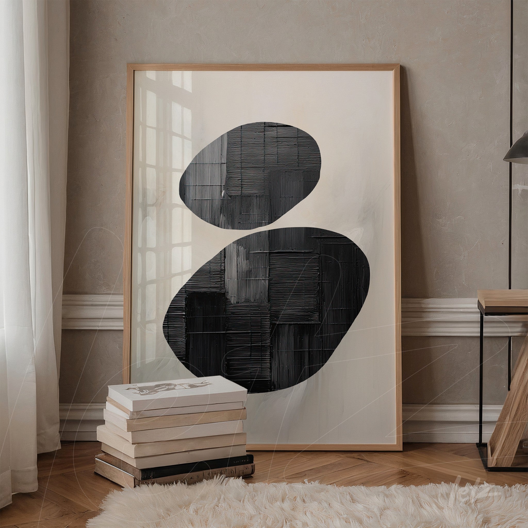 abstract art print in black on light background with natural wood frame