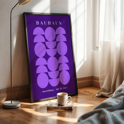 poster with Bauhaus style geometric illustration on purple background and black frame on wooden floor