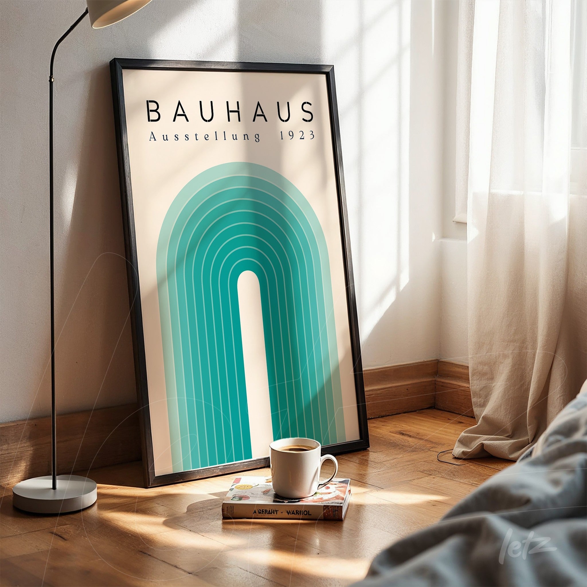 minimalist bauhaus art poster in blue and beige displayed in a black frame leaning on a wooden floor next to a modern lamp