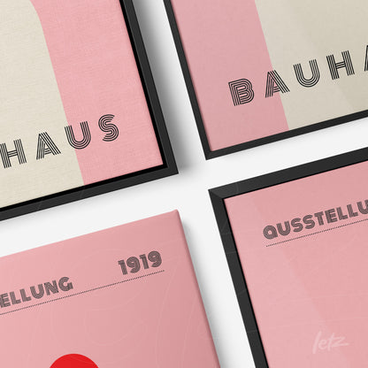 composition with four modern art prints in Bauhaus style with black frame