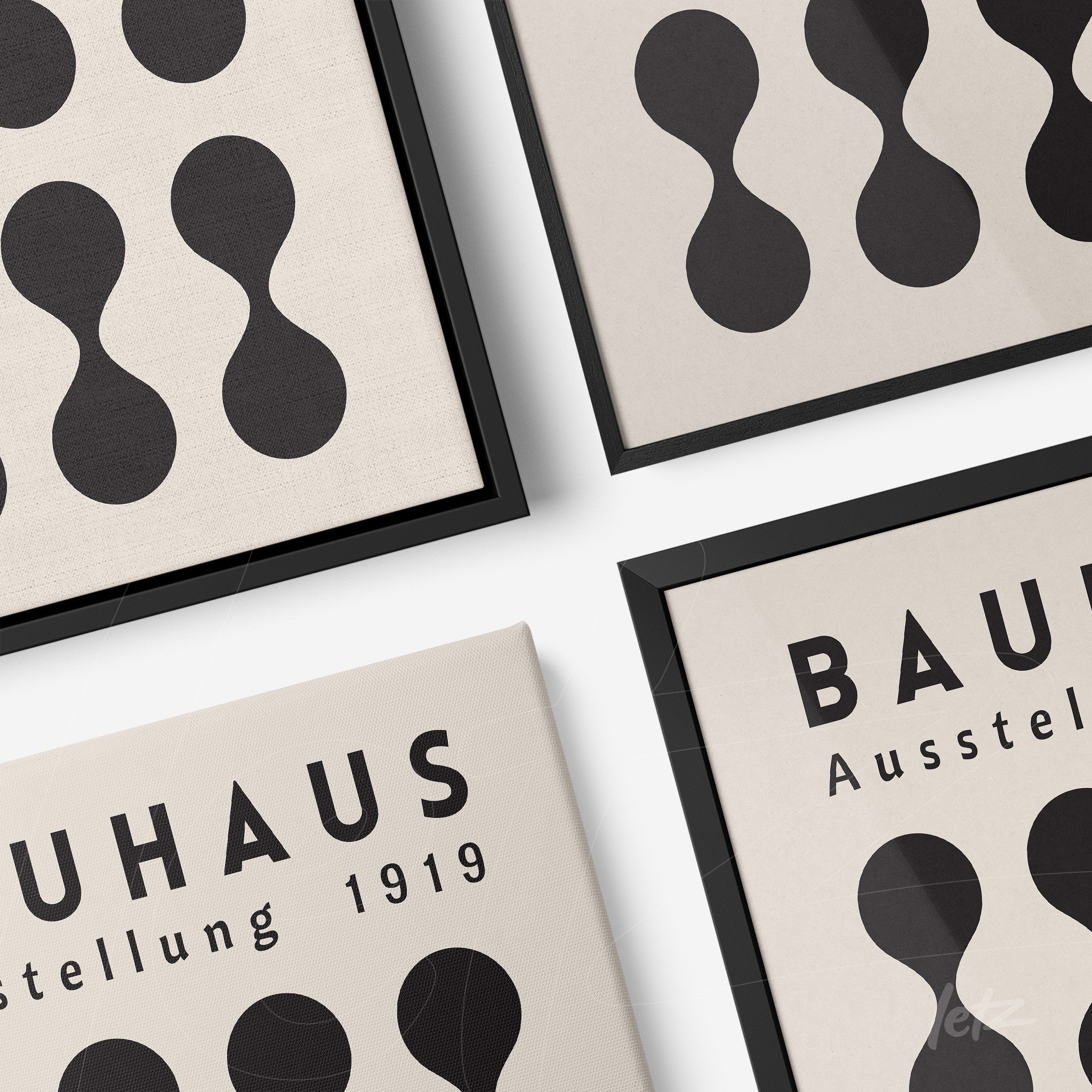 set of canvas artworks featuring geometric bauhaus design with black frames on white background