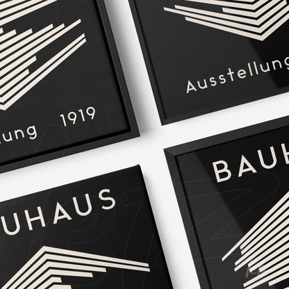set of canvas art prints featuring geometric black and white bauhaus-style design with textual details and thin black frames