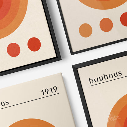 four minimalist bauhaus style prints featuring orange tone circles with thin black frames