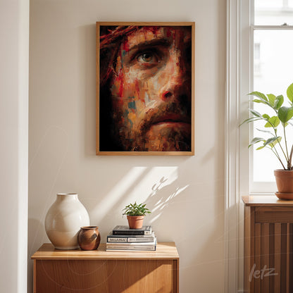 framed artwork depicting the face of a male figure with an intense expression in vibrant impressionist painting style