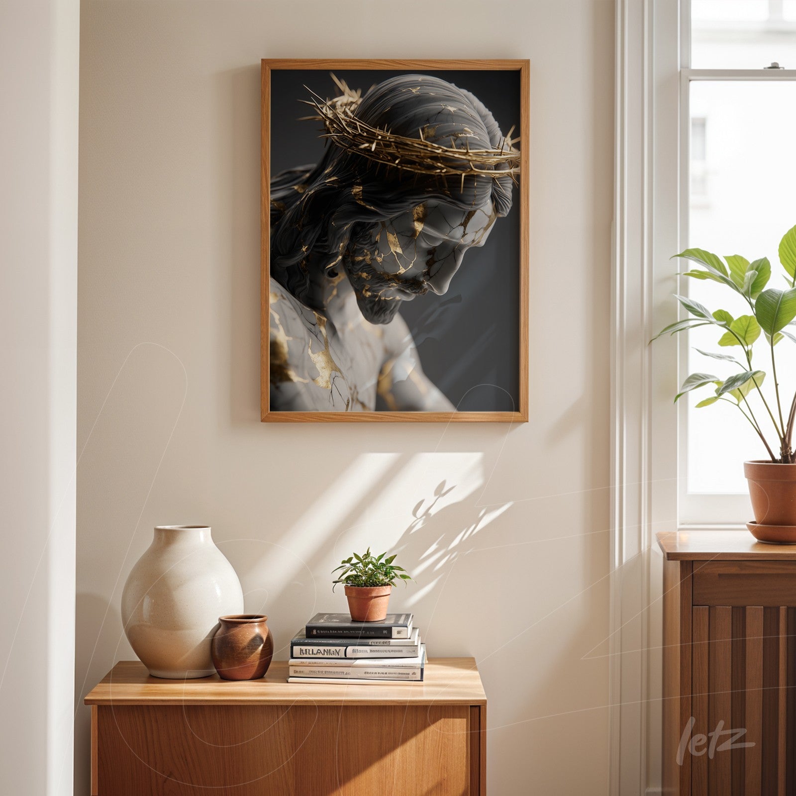framed wall art of artistic portrait of Jesus Christ wearing thorn crown in light wooden frame displayed in a bright room with indoor plants