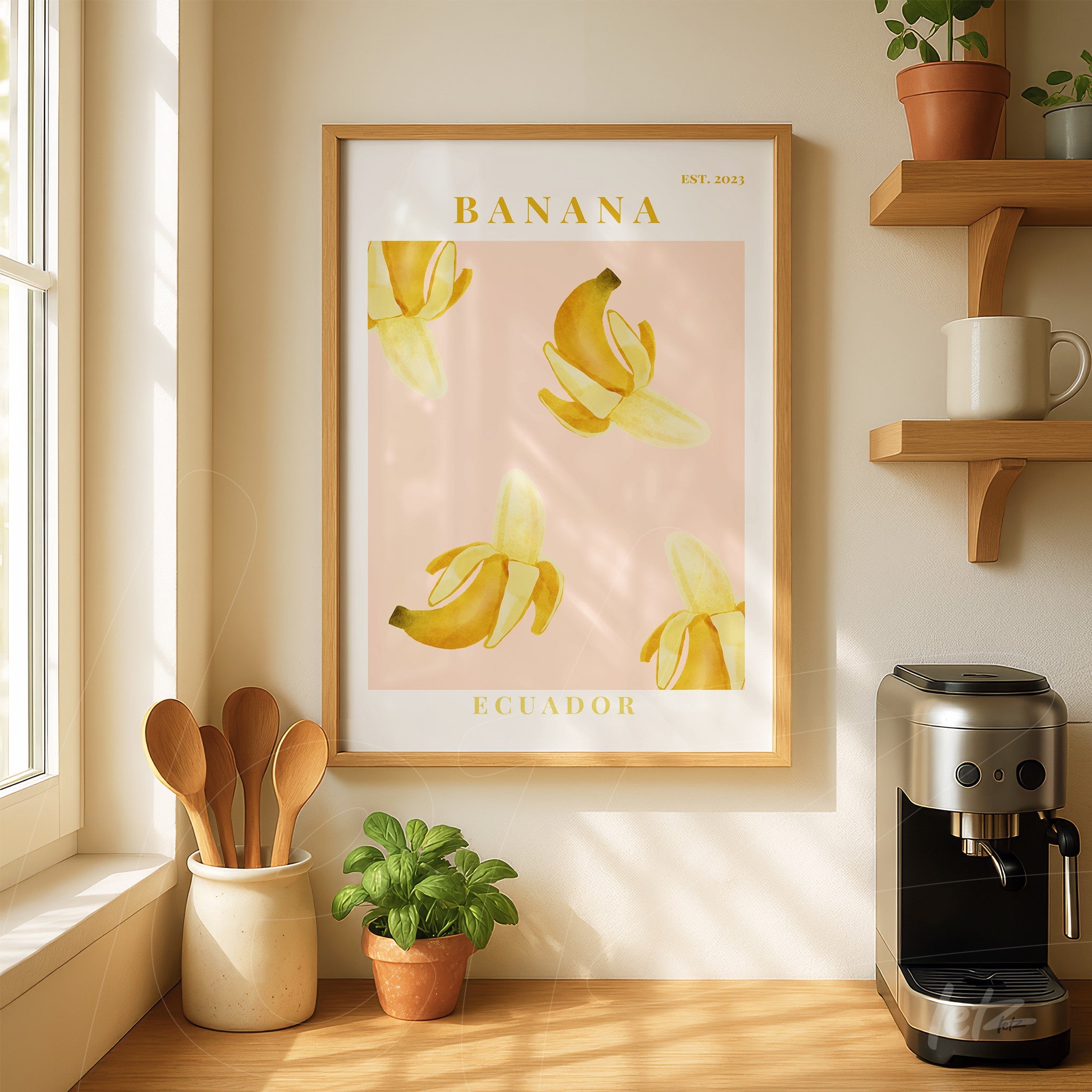 framed wall art featuring stylized banana illustrations on a soft pink background