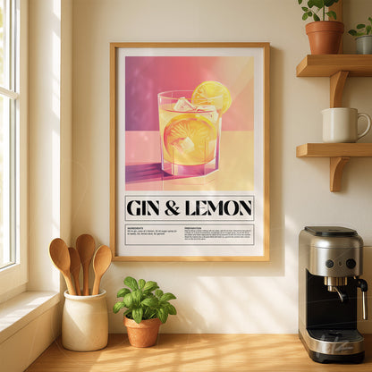 framed artwork of gin and lemon cocktail in light wood frame displayed on a shelf next to a coffee maker