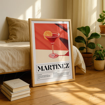 framed art piece featuring a digital illustration of a martini drink with a clear wooden frame next to indoor plants