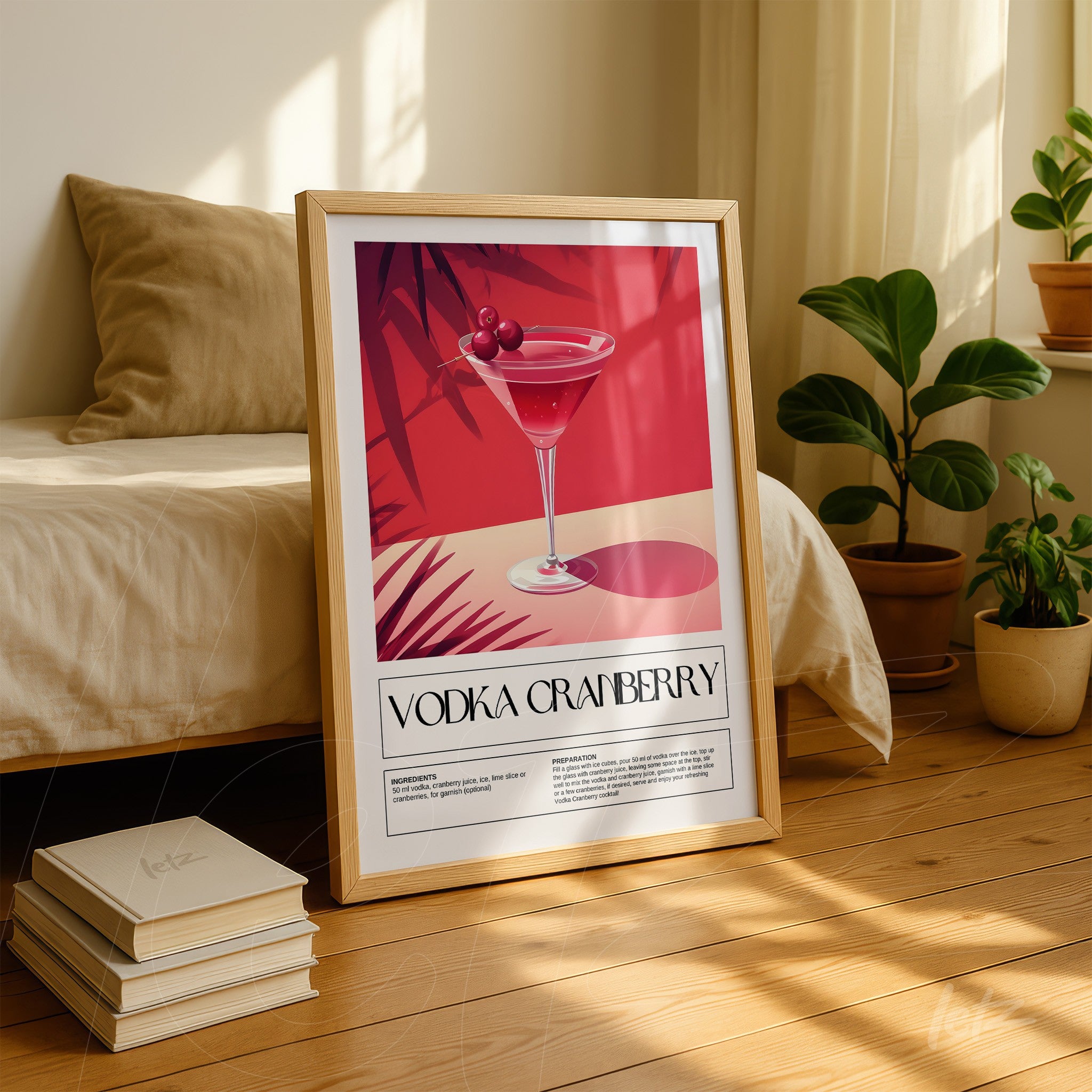framed retro-style art of vodka cranberry cocktail with light wood frame displayed in a cozy setting featuring plants in the background