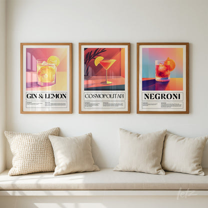 set of decorative wall art featuring cocktail illustrations with light wood frames and vibrant backgrounds
