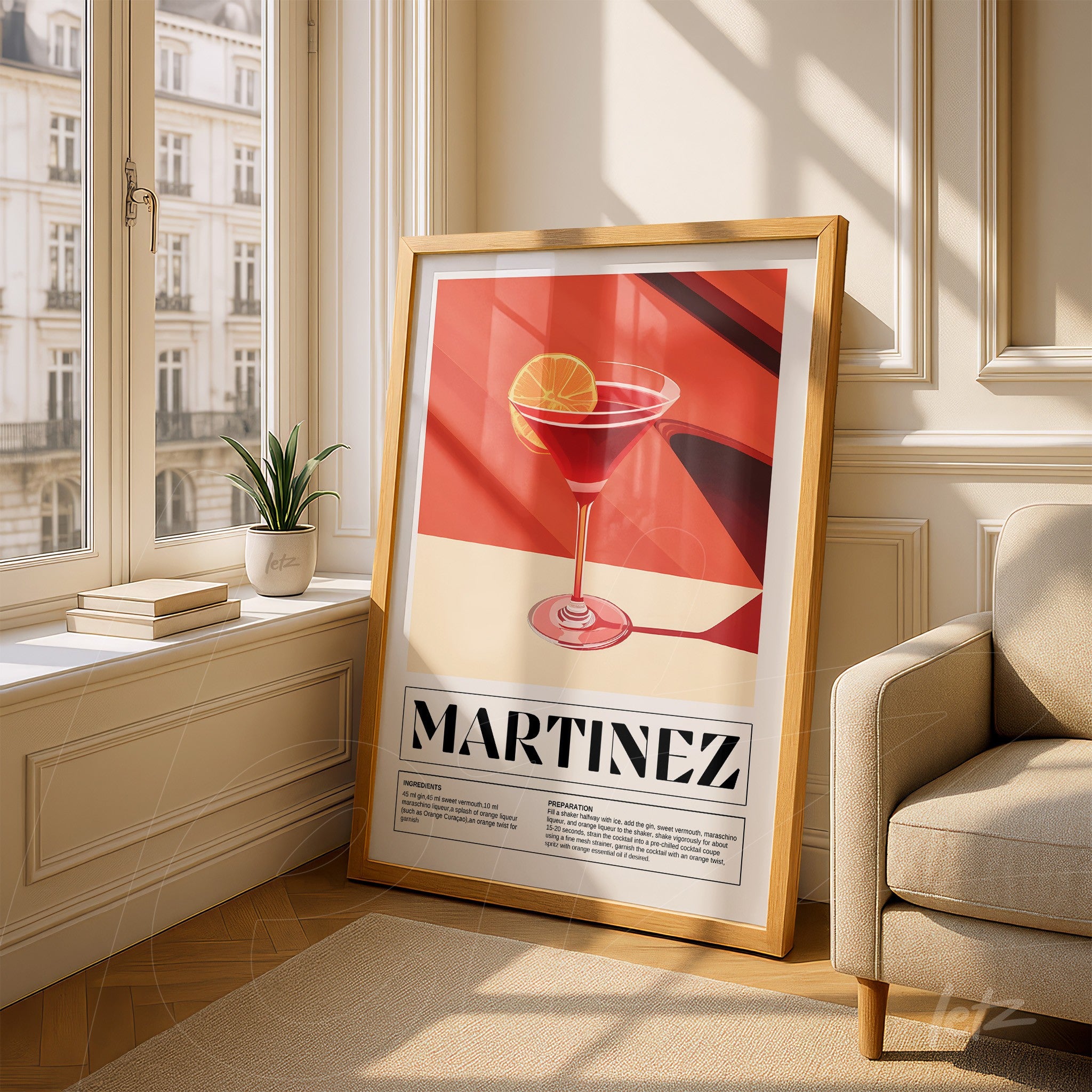 framed wall art of martinez cocktail in light wooden frame, displayed in a bright room with natural light