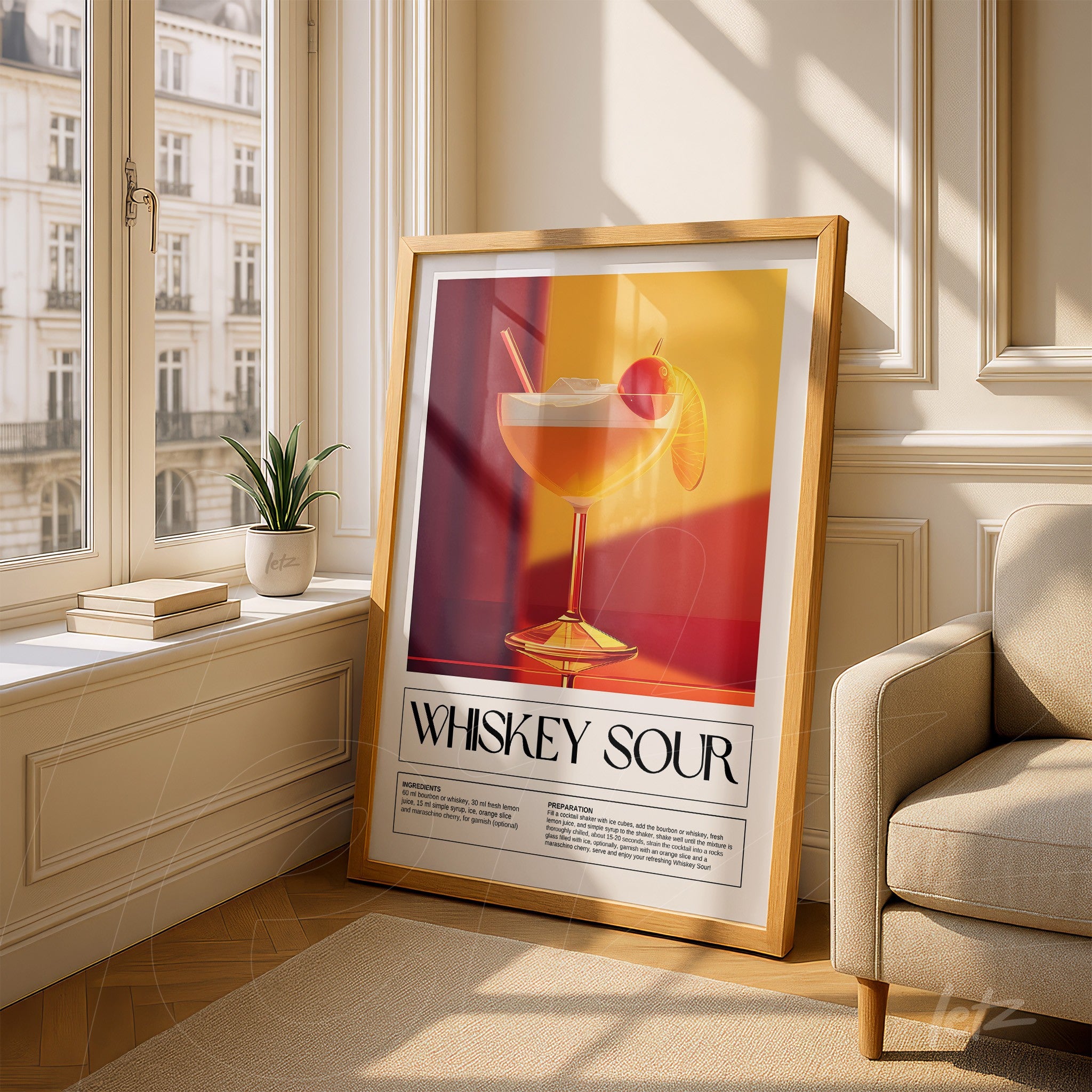 framed art piece of whiskey sour cocktail in light wood frame displayed next to a potted plant on a sunlit table in a living room