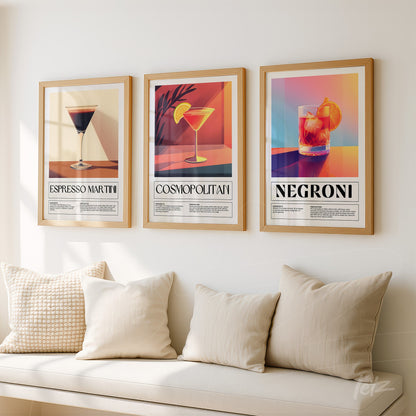 collection of three framed wall arts featuring cocktails, including espresso martini, cosmopolitan, and negroni against a light wall