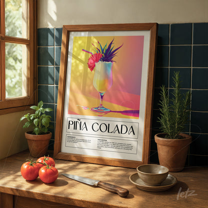 framed colorful art of piña colada cocktail displayed on wooden table next to tomatoes and plants