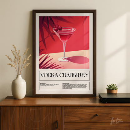 retro style wall art of vodka cranberry cocktail in dark frame on wooden table