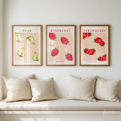 series of framed artworks featuring fruits with illustrations of pear, raspberry, and strawberry on pink background