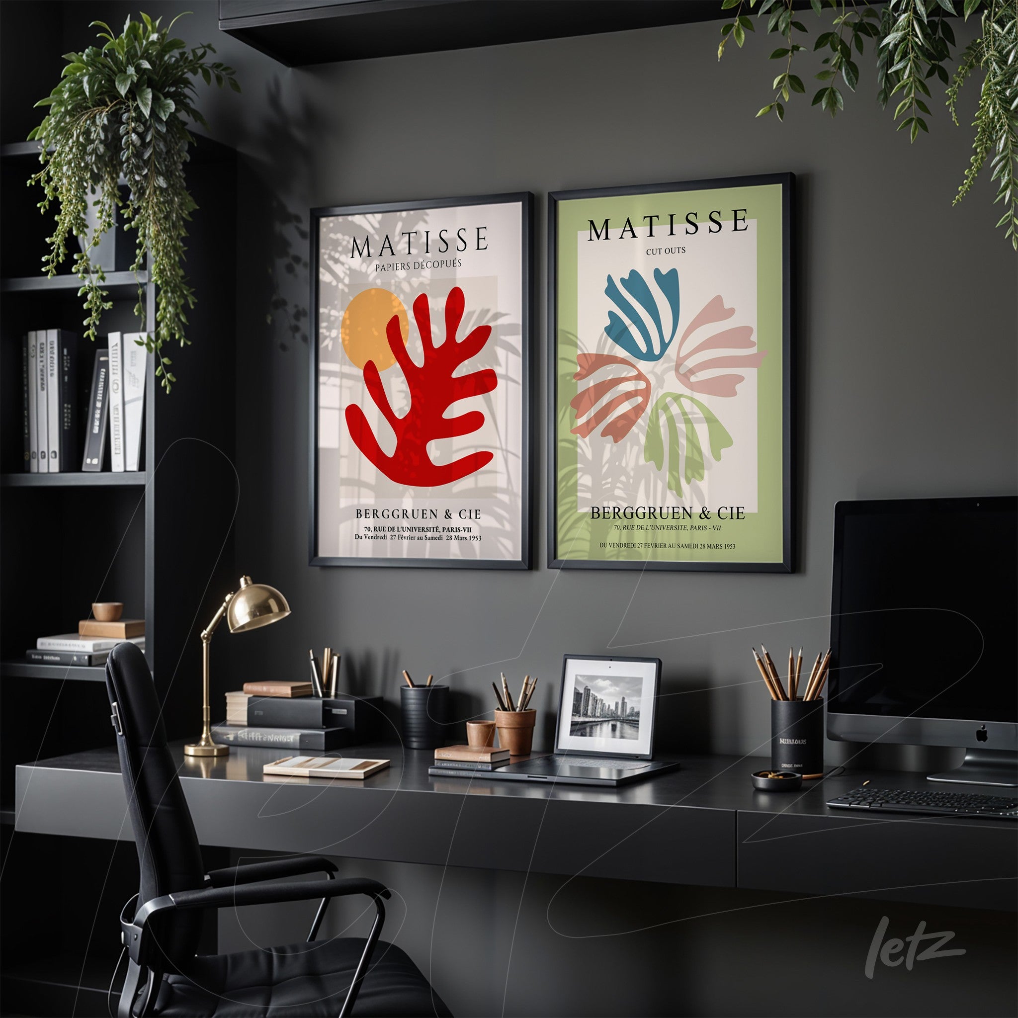 set of framed modern art prints featuring organic shapes in red, blue, and cream against light backgrounds in black frames