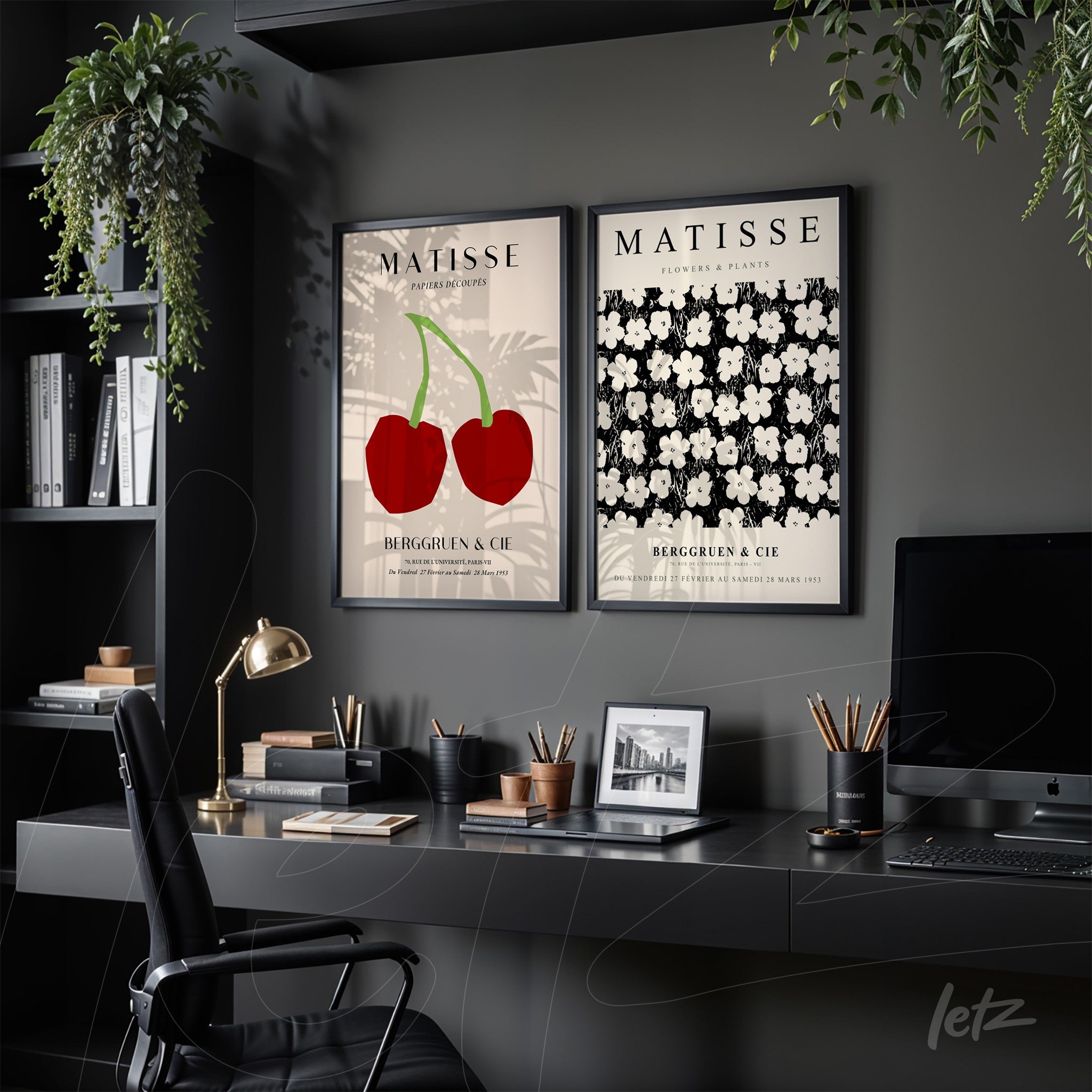 collection of framed wall art featuring red cherries and white flowers on a black background