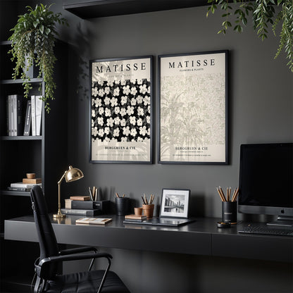 framed wall art composition featuring matisse flower designs on dark gray wall