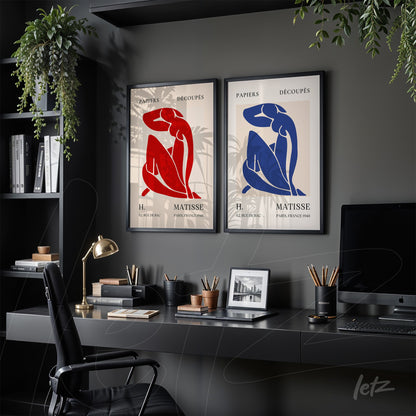 composition of decorative frames featuring human figures in red and blue, black frames displayed in a modern setting with a black shelf