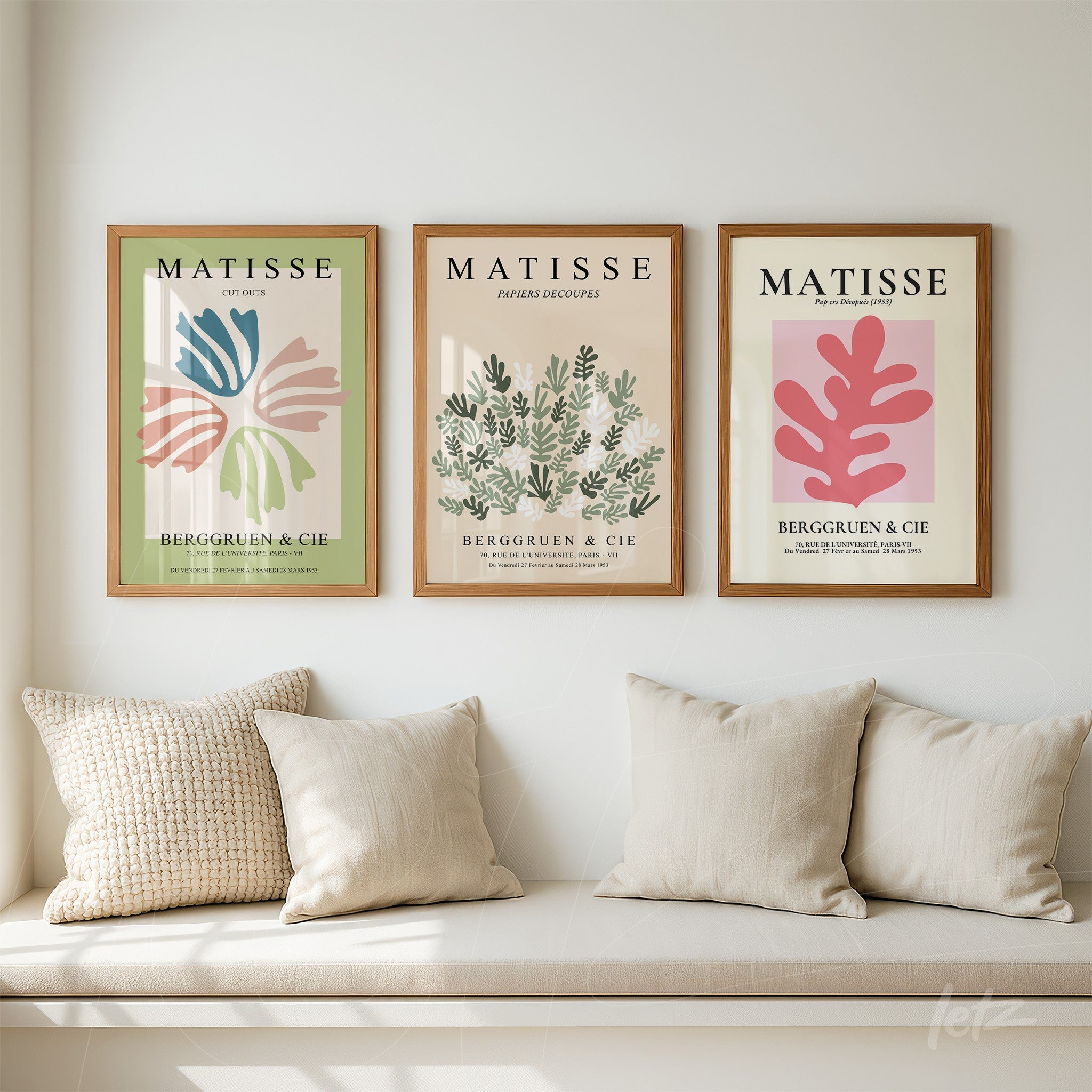 set of framed botanical illustrations in light wood frames