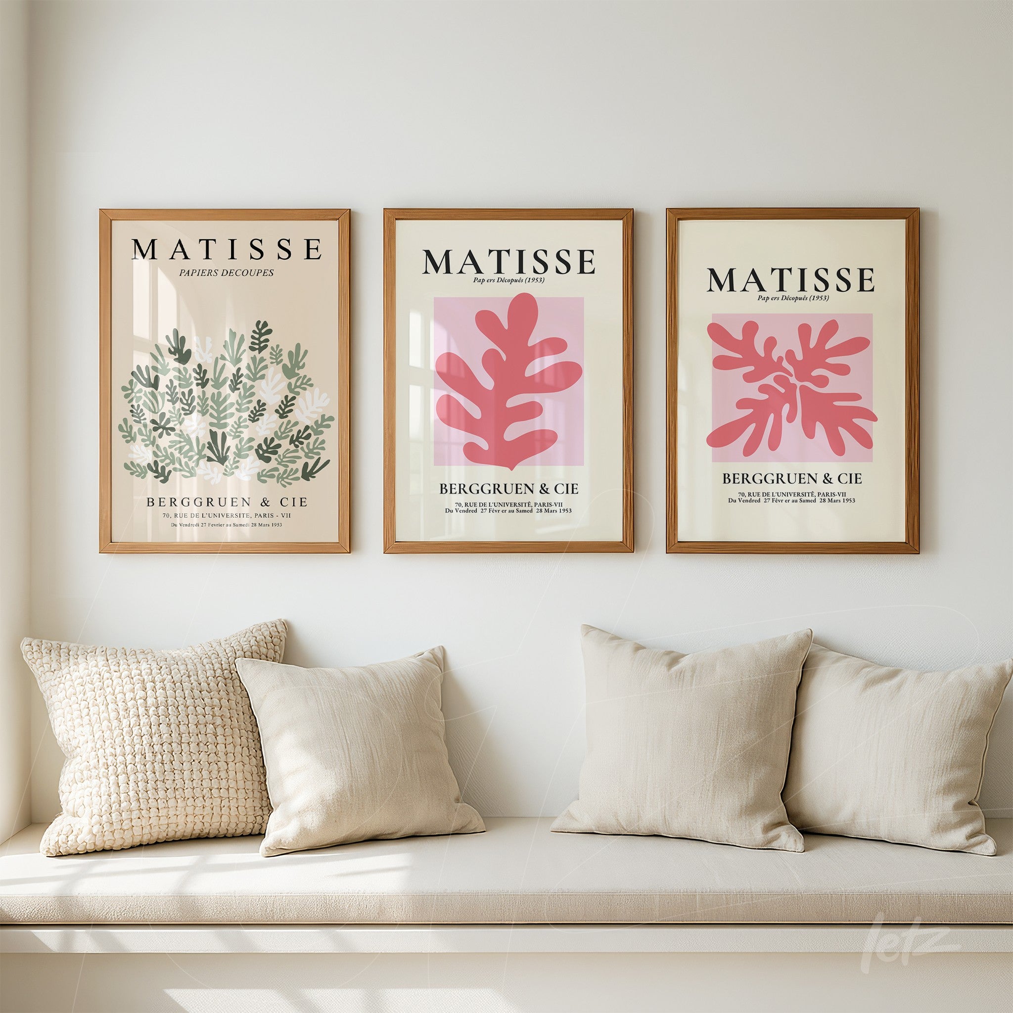set of decorative wall art featuring distinct botanical illustrations in light wood frames against a neutral background