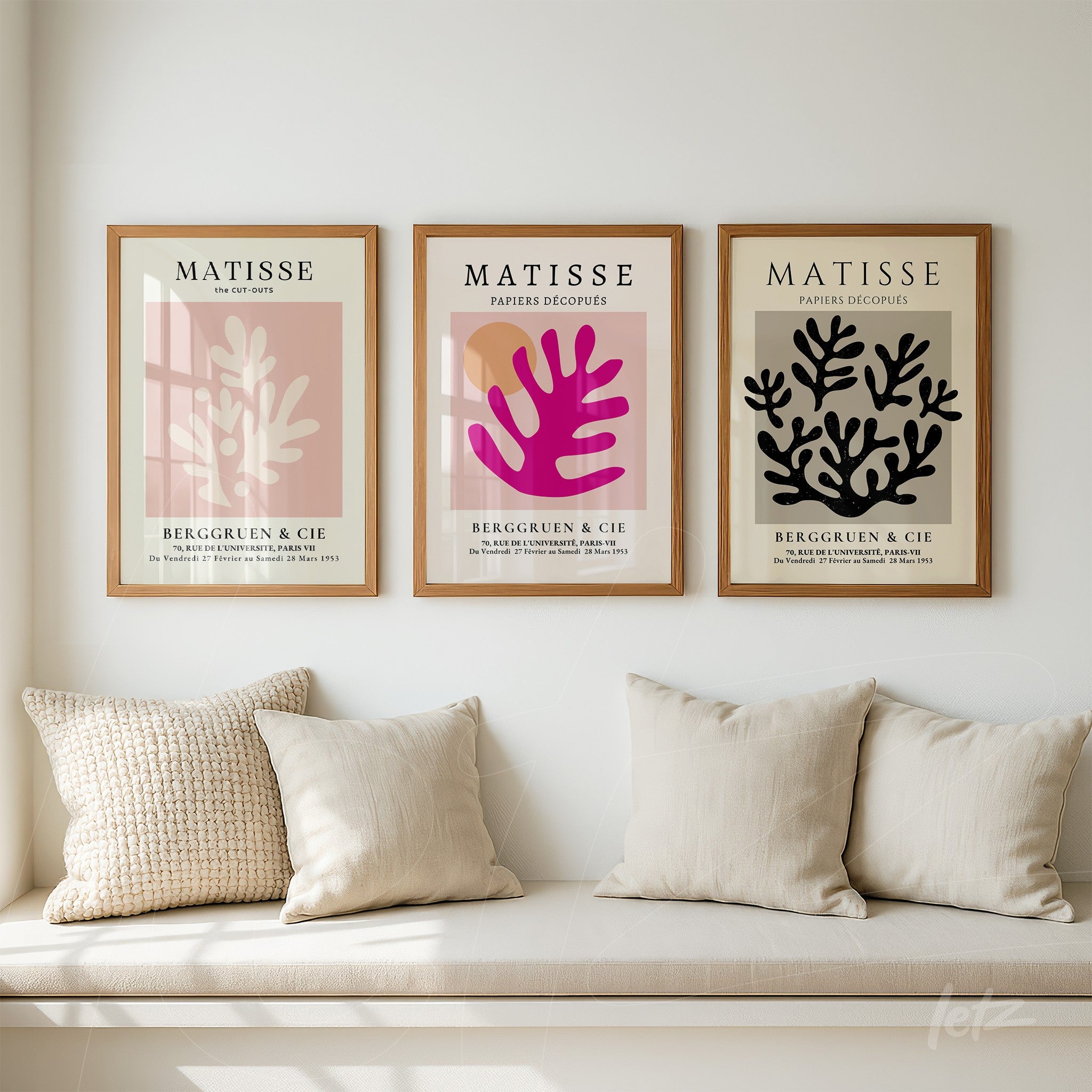 collection of three framed artworks inspired by Matisse featuring abstract shapes in shades of pink, purple, and black on a light background