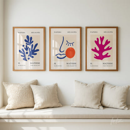 set of three framed artworks featuring abstract designs with organic shapes in vibrant colors