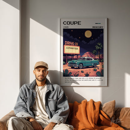 retro style framed art featuring a 1949 Mercury car in a drive-in cinema scene with white frame displayed on a light wall next to a man sitting on a sofa
