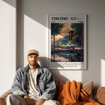 framed wall art featuring a retro illustration of a 1969 Ford Torino GT reflected in water, displayed above a modern sofa