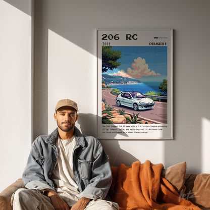 framed art featuring a digital illustration of a Peugeot 206 RC in a coastal scene, displayed on a light wall beside a man sitting on a sofa
