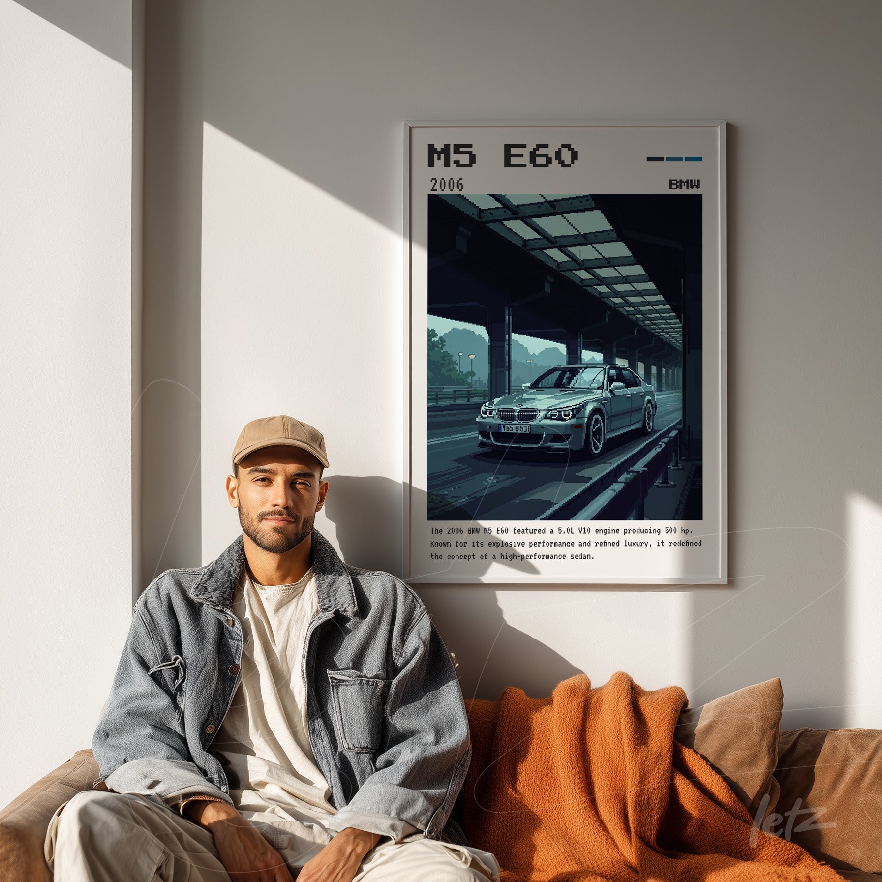 retro style wall art depicting a 2006 BMW M5 E60 illustration framed in white on a light wall