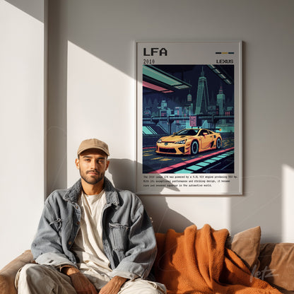 framed art print of the nostalgic lexus lfa car in white frame displayed on a light wall with a man seated beside it