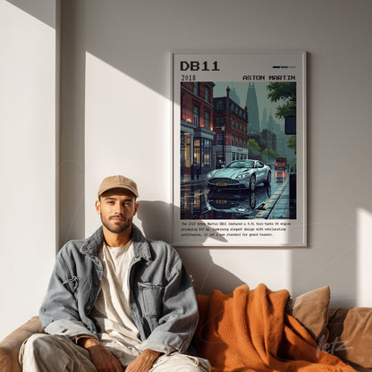 framed graphic art of the aston martin db11 car with an urban background in a white frame displayed in a modern living room