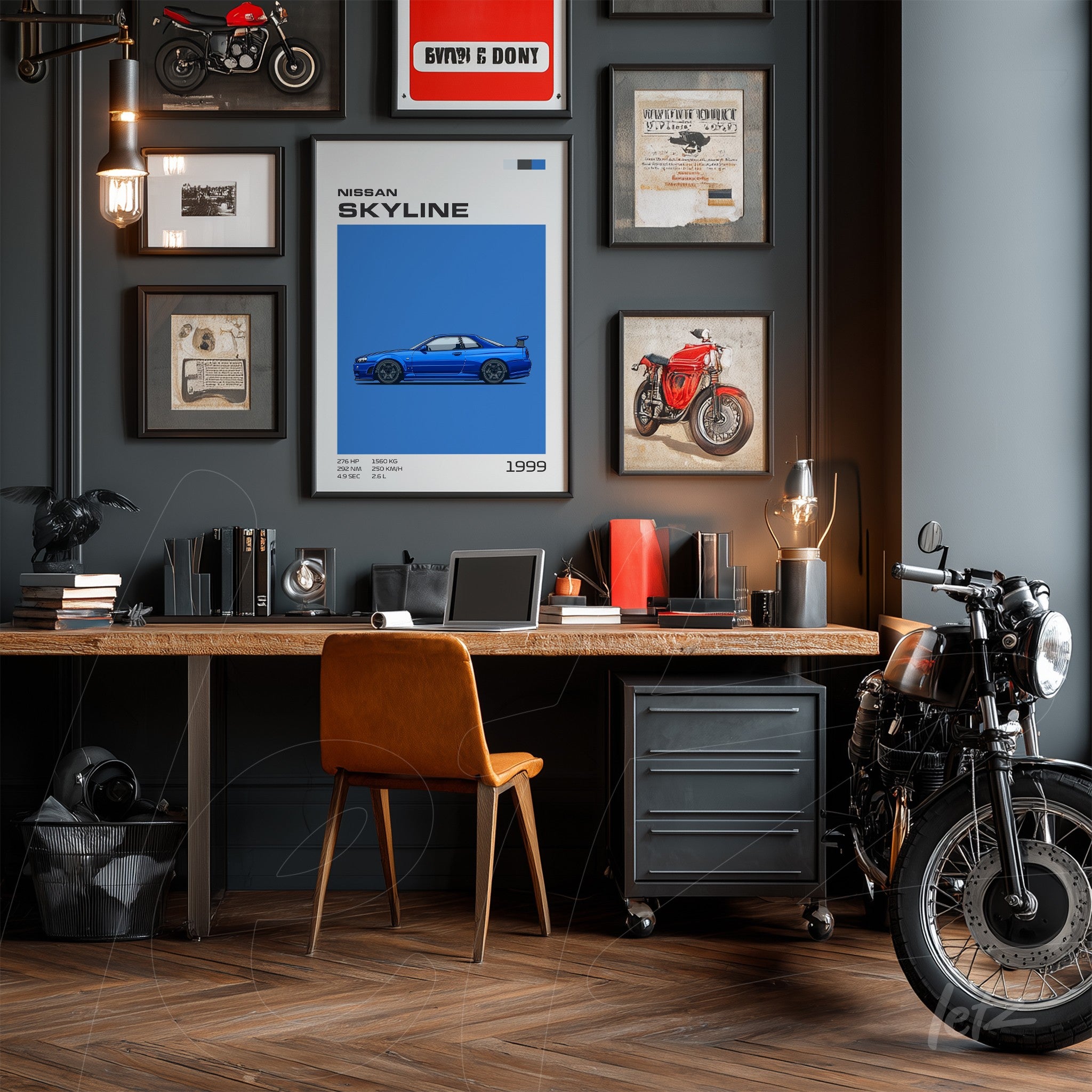 decorative wall art collage in gray featuring automotive themes and a vintage motorcycle beside a wooden desk