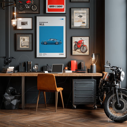 framed artwork of 1988 Porsche 911 in white frame on a wall decorated with various vintage memorabilia pieces