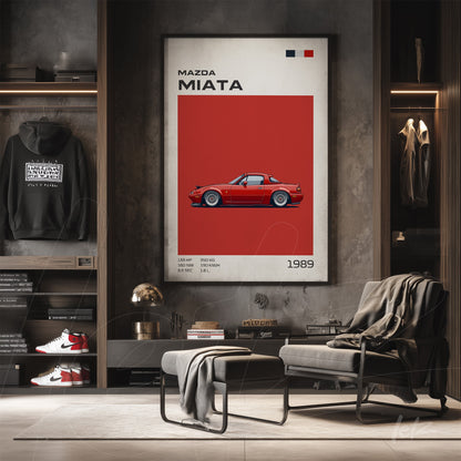 framed wall art of 1989 Mazda Miata against a vibrant red background