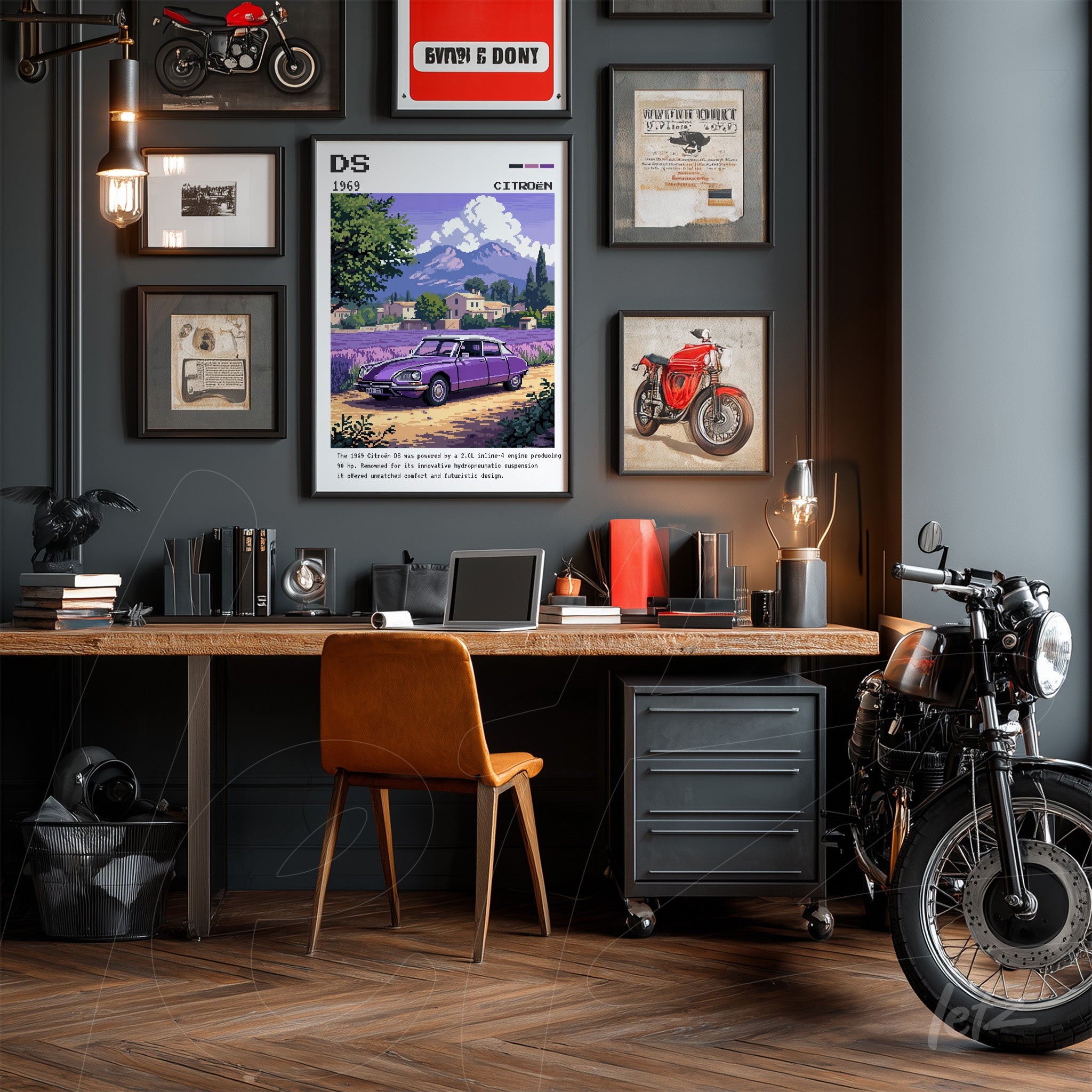 office environment featuring vintage artwork of Citroën DS in black frame, decorated with motorcycle pictures and objects
