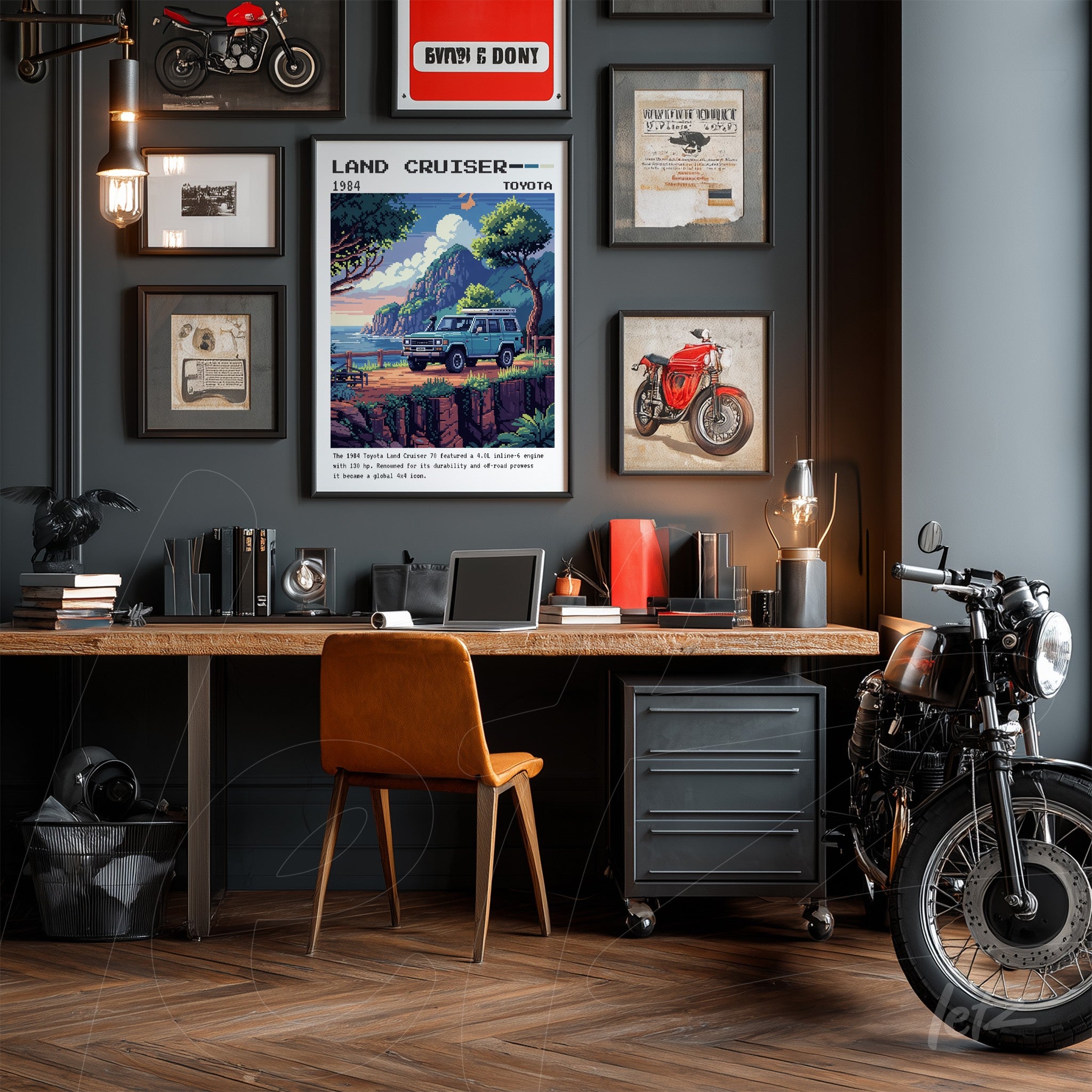 retro framed artwork of 1984 Toyota Land Cruiser in industrial style room with wooden desk and vintage motorcycle beside it