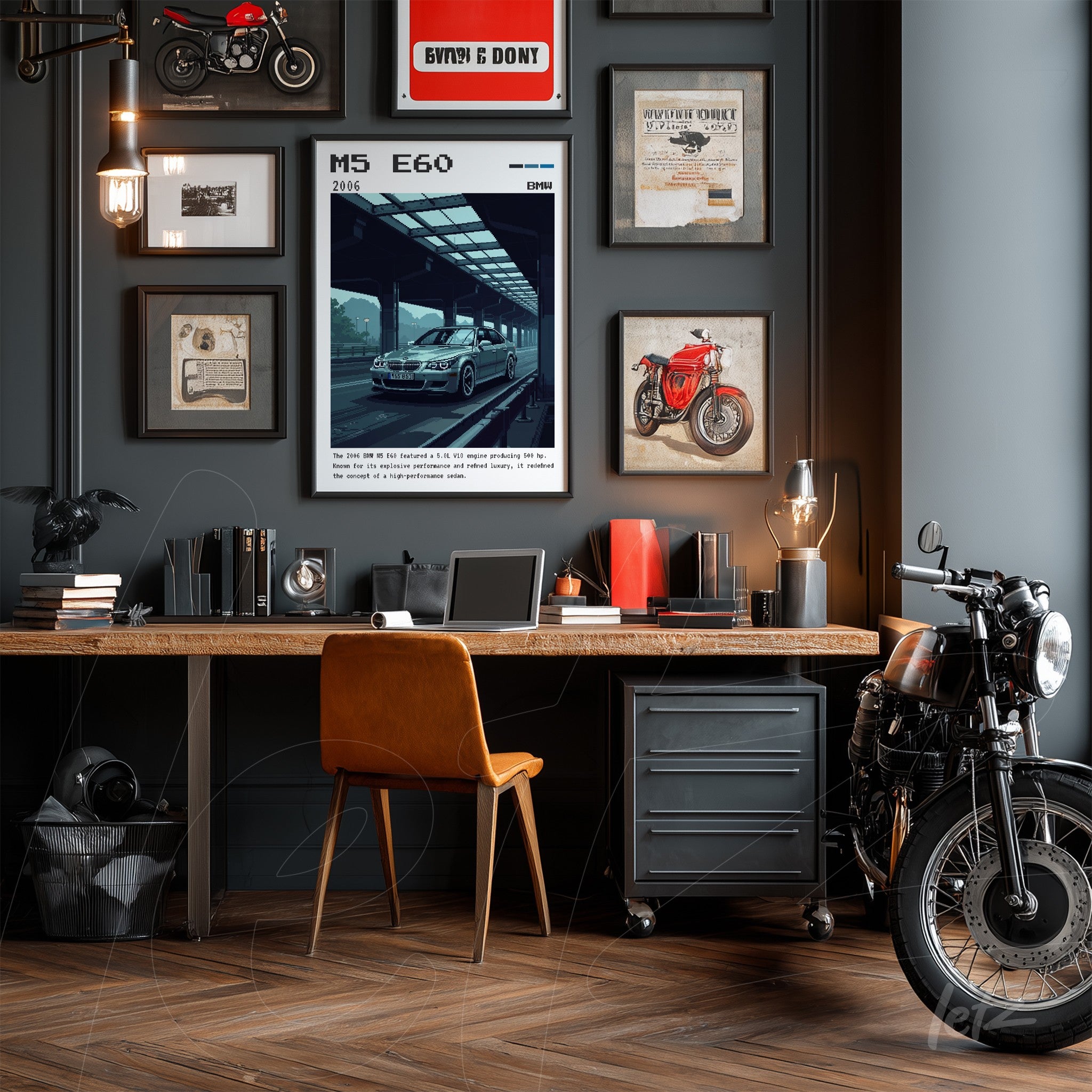 decorative wall art arrangement in a modern office with gray background featuring a BMW M5 print and framed motorcycle images, light wooden desk with brown leather chair and a classic motorcycle beside it