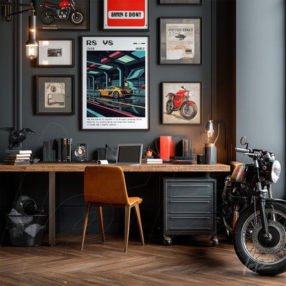 vintage motorcycle and modern artwork collection on dark wall with framed sports car art in focus, wooden desk with orange chair and motorcycle beside it