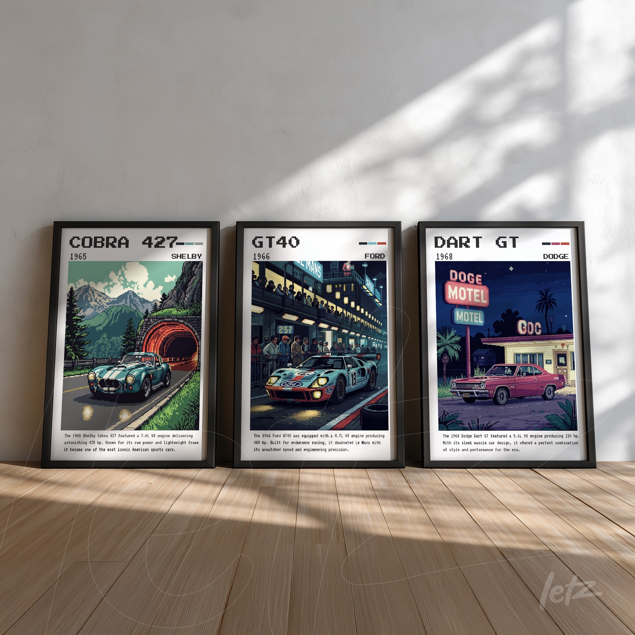 collection of three framed vintage car illustrations featuring a shelby cobra 427, a ford gt40, and a dodge dart gt displayed against a light wall and wooden floor