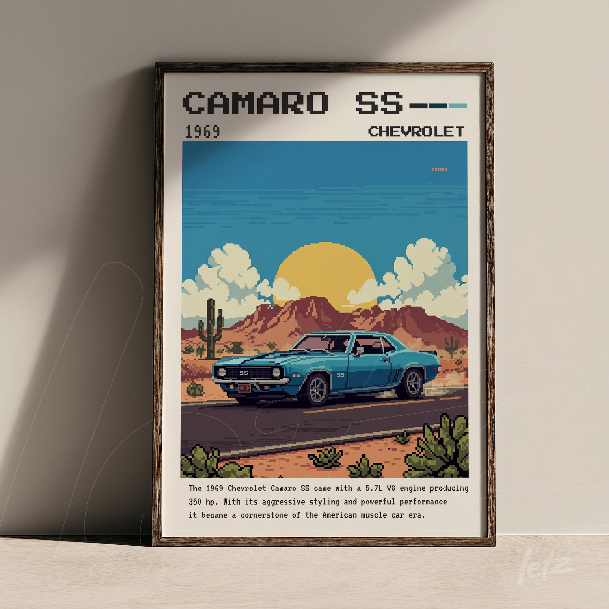 framed pixel art of a 1969 Chevrolet Camaro SS with dark wood frame featuring mountains and cacti in the background