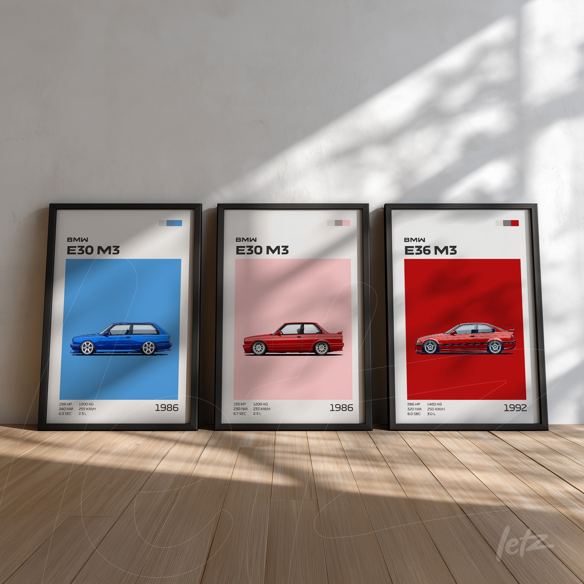 series of framed illustrations of BMW M3 cars in black frames with blue, pink, and red backgrounds