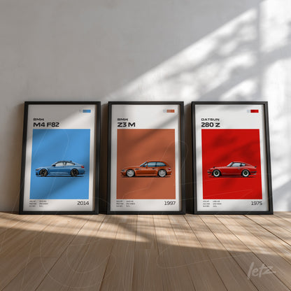collection of framed wall art featuring iconic cars, including a blue bmw m4 f82, an orange bmw z3 m, and a red datsun 280 z, all with black frames against a white background