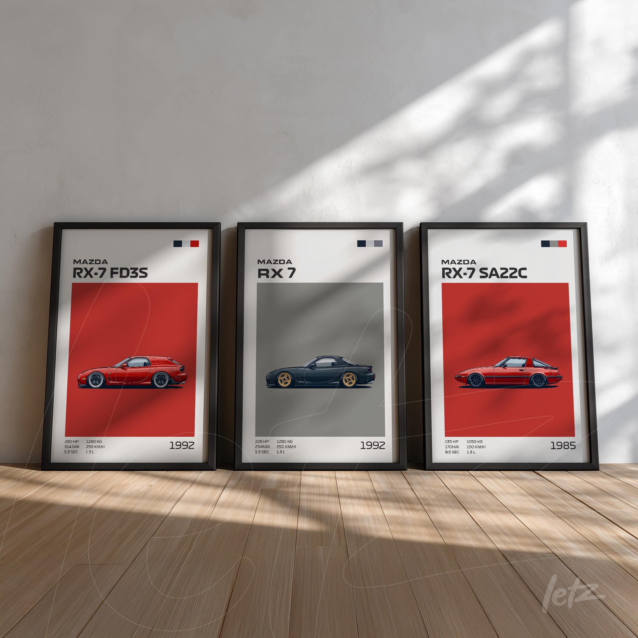 collection of framed wall art featuring Mazda RX-7 illustrations in black frames with red and gray backgrounds