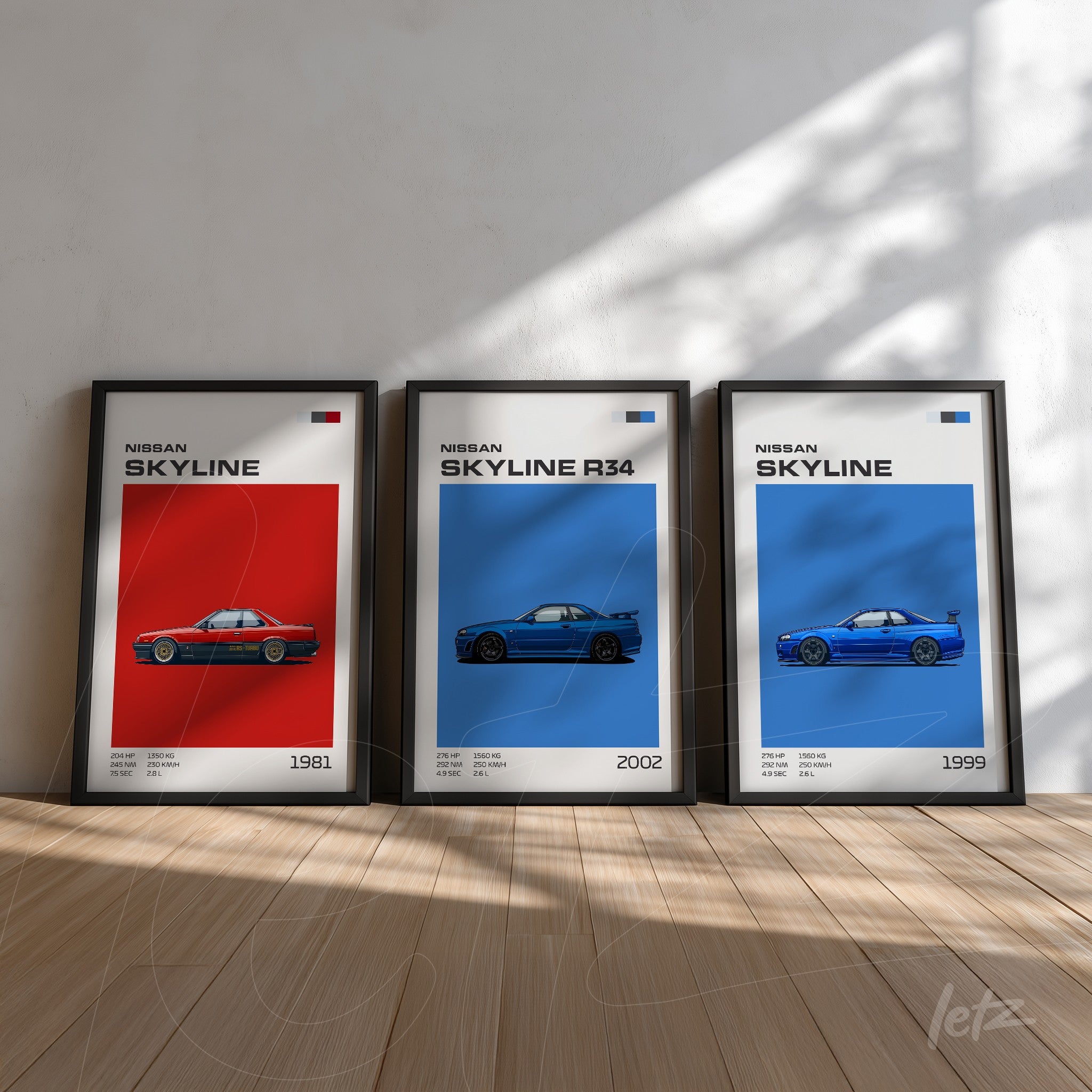 collection of framed wall art featuring Nissan Skyline car illustrations in black frames, with red and blue backgrounds displaying the years 1981, 1999, and 2002