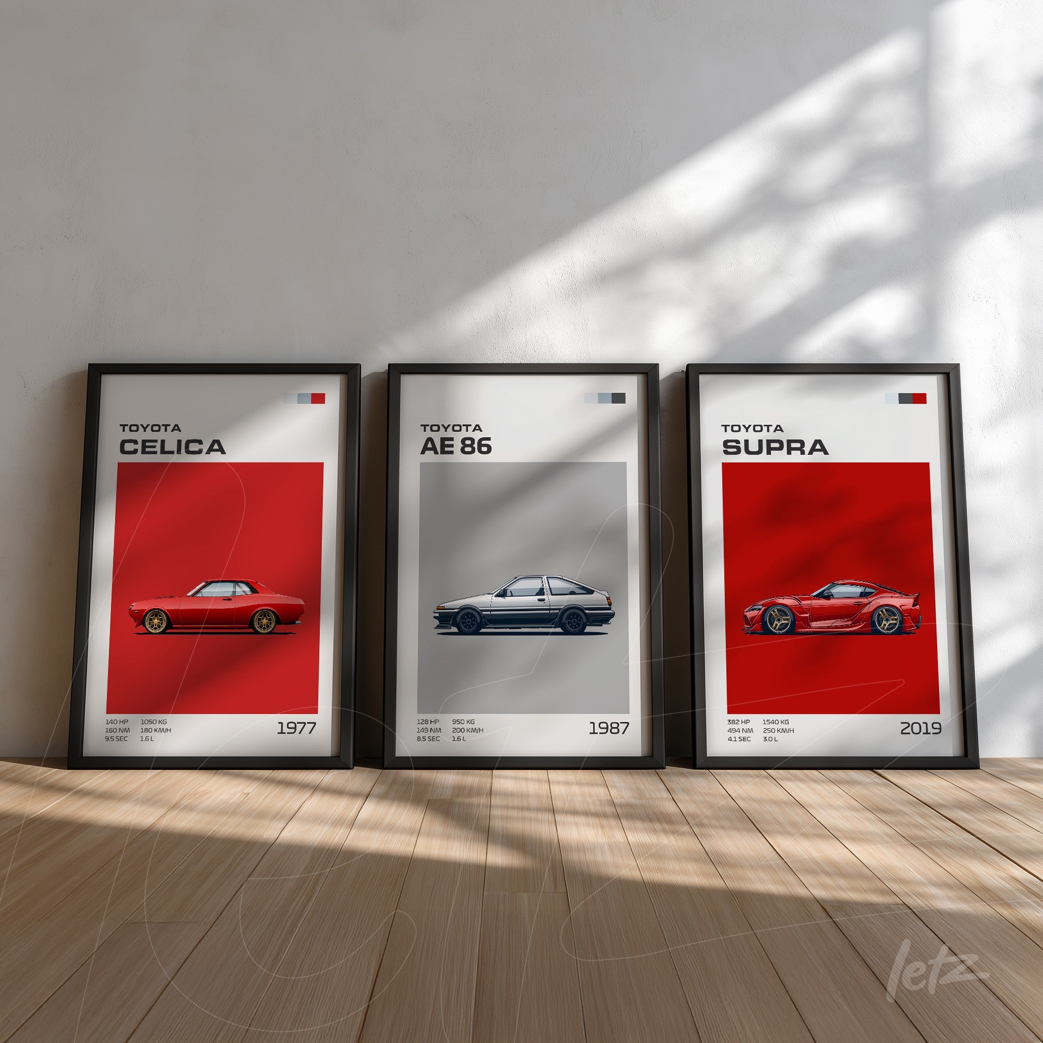 collection of framed artworks featuring illustrations of three Toyota car models: Celica 1977, AE 86 1987, and Supra 2019 with black frames against a red background