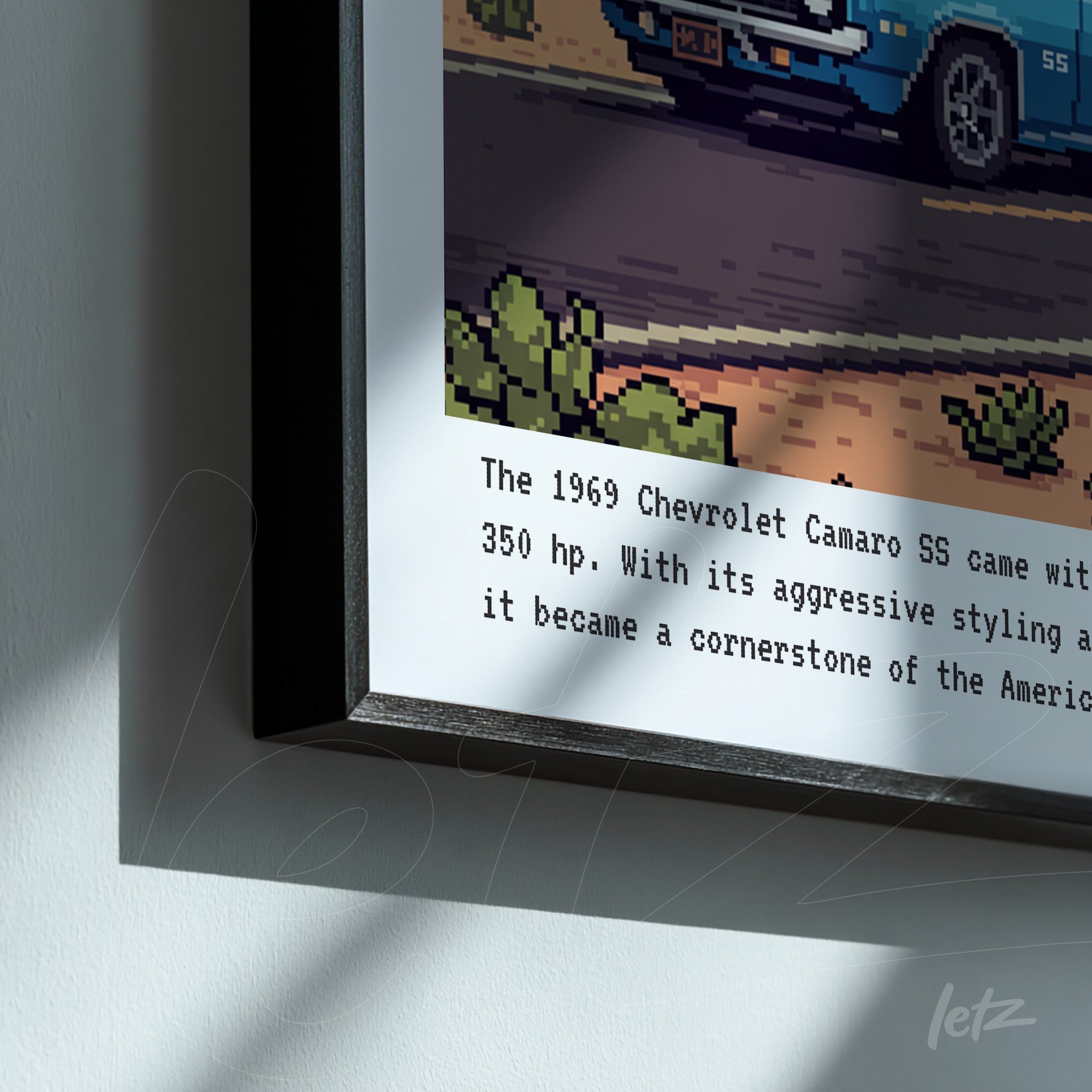 framed pixel art of the 1969 Chevrolet Camaro SS with black frame and descriptive text
