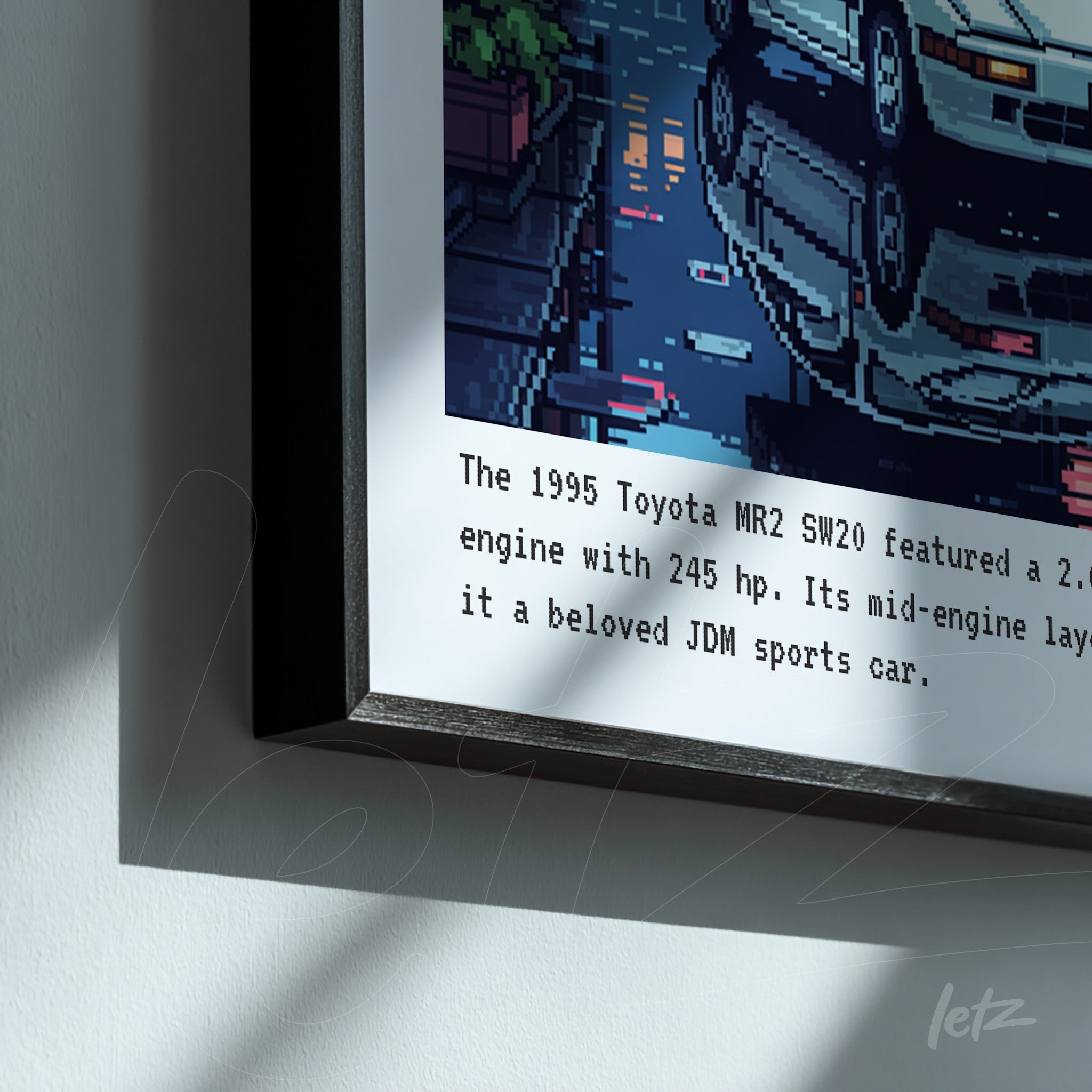 framed digital art featuring a 1995 Toyota MR2 SW20 car, black frame with pixelated texture background